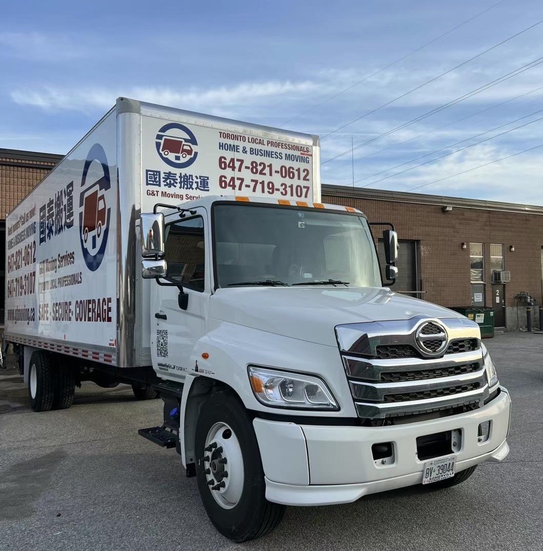 G&T Moving truck and crew handling a Toronto delivery job