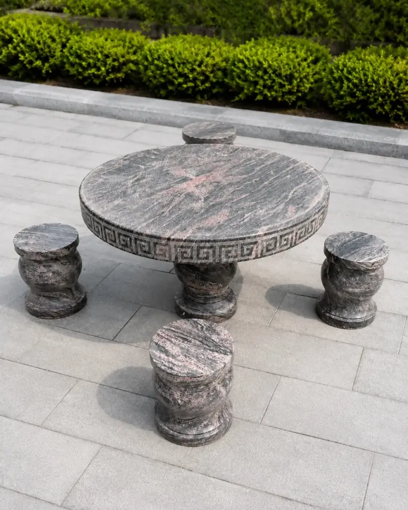 Polished Dark Marbled Stone Round Table Set — Dark marbled natural stone for Toronto & GTA outdoor spaces | G&T Moving